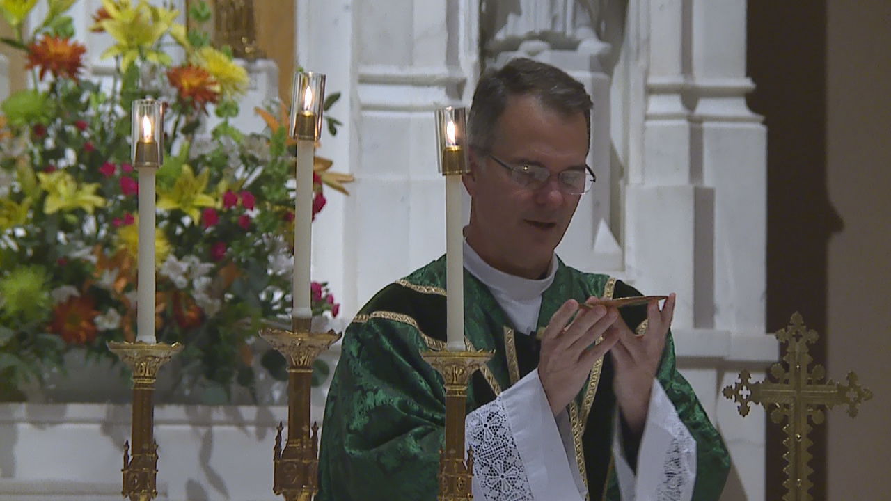 Rev. Peter Mangum leads Saturday evening mass.jpg